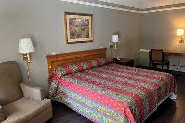 Отель Guest Inn & Suites