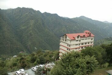 هتل Manla Homes Resort