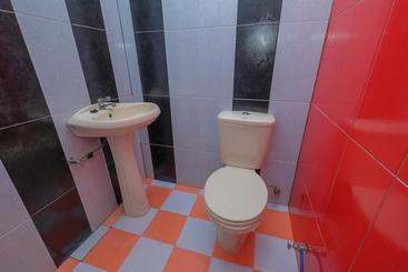 پانسیون Reddoorz Syariah Near Syamsudin Noor Airport 2