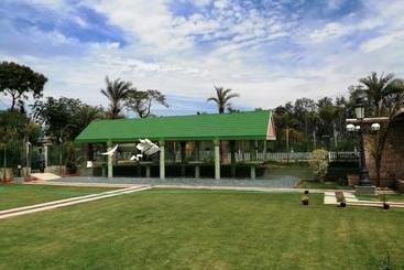 استراحتگاه Mann The Palm Retreat