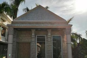 استراحتگاه Mann The Palm Retreat