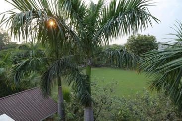 استراحتگاه Mann The Palm Retreat