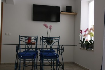 آپارتمانهای توریستها House Of Orchids With Pátio