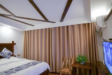 مسافرخانه Floral Hotel · Spring Guesthouse Zhangjiajie