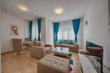 M Apartments