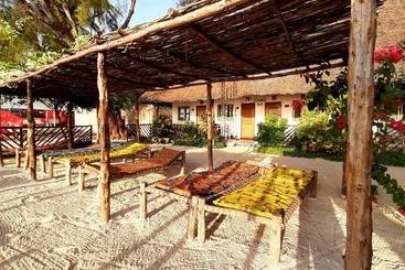 تختخواب و صبحانه Sunrise Lodge Zanzibar