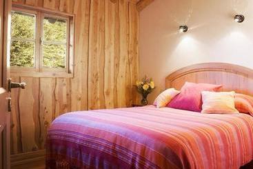 تختخواب و صبحانه La Confluencia Lodge