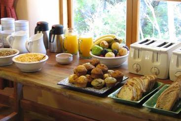 تختخواب و صبحانه La Confluencia Lodge