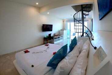 Отель Bukit Pool Suites