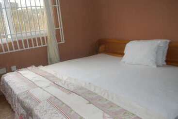 مبيت وإفطار Highlander Guest House
