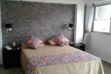 هتل کپسول Neferet Habitaciones Temporarias