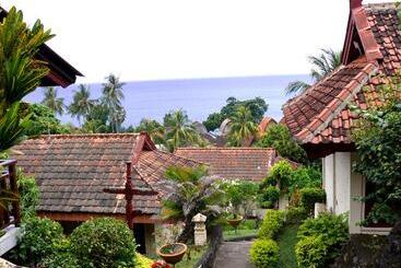 هتل Puri Bunga Beach Cottages