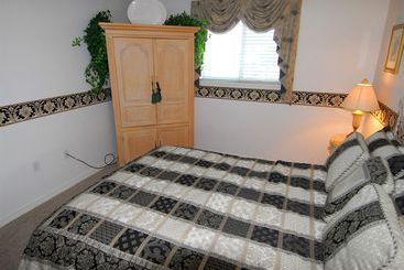 هتل Resortquest Rentals At Crystal Sands East & West