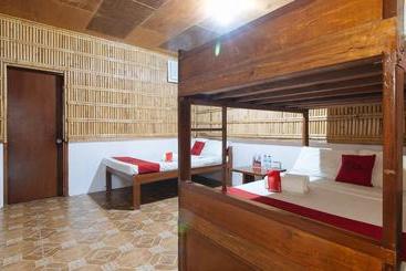 هتل Reddoorz Hostel At Megans Paradisio Beach Resort