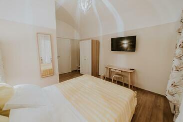 تختخواب و صبحانه La Casa Di Achille