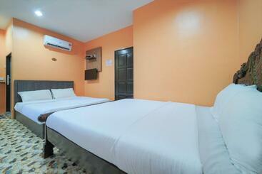 Spot On 89974 D Amigos Motel