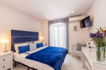 تختخواب و صبحانه Suites @ Portarade