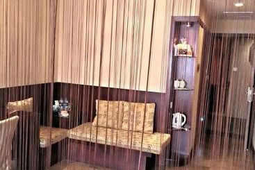 Baolong Homelike Youyi Hotel
