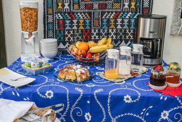 تختخواب و صبحانه Casa Shanti Niketan