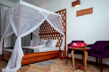 تختخواب و صبحانه Kuti Hotel Stone Town