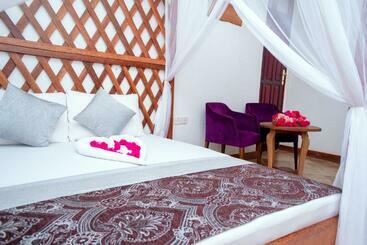 تختخواب و صبحانه Kuti Hotel Stone Town
