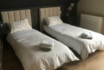 مبيت وإفطار Les Coquelicots   Chambre Marie