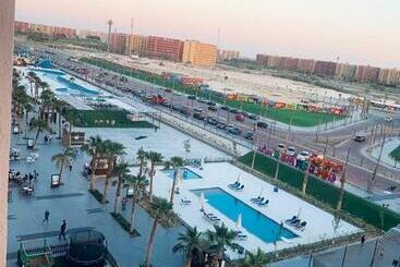 Tourist flats Wonderful Private Apartment Pool View Infront Of El Alamein Towers