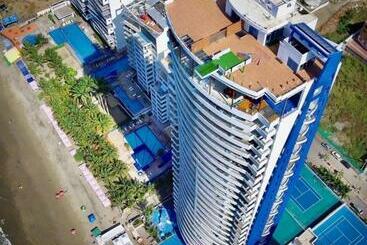 هتل آپارتمان Grand Diamond Beach Lujoso Departamento Frente Al Mar