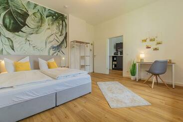 דירות לתיירים Modernes Apartment   Zentral, Ruhig, Wlan, Netflix, Küche, Schreibtisch, Parkplatz, Waschtrockner