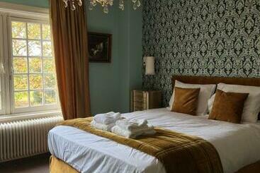 צימר Cuatre Brass Stay