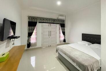 בית מלון כפרי Lucky 21 Syariah Mitra Reddoorz