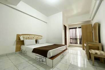 هتل Oyo 90184 Api Api Guesthouse 533