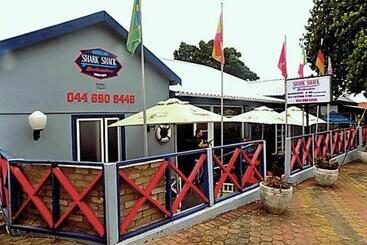호스텔 Shark Shacks