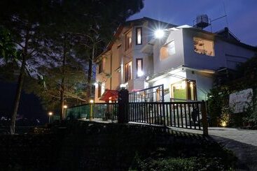 בית מלון כפרי Treebo Vista Lago With Lake View