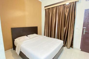ホテル Reddoorz Syariah @ Jalan Jendral Sudirman Pekanbaru
