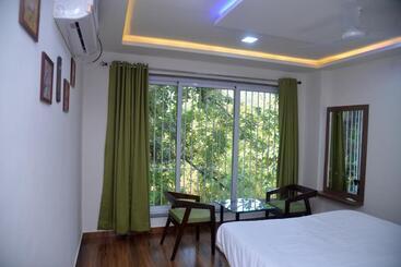 Отель Dhanlakshmi Orchard Resort