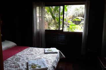 تختخواب و صبحانه Cabinas Nirvana Ecolodge