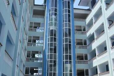 Cowrie Shell Beach Apartments Official