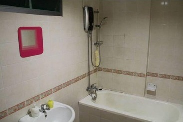 בית מלון כפרי Putra Place Home Inn
