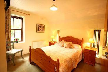 تختخواب و صبحانه Woodbine Cottage