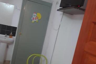 هاستل Hostal Pizzeria Oasis