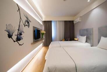 Magnotel Hotel Qionghai Wanquanhe Aihua Road