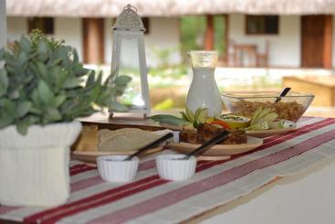 تختخواب و صبحانه Naturalmente Boutique Bungalows Y Cocina Mediterránea