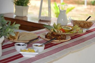 تختخواب و صبحانه Naturalmente Boutique Bungalows Y Cocina Mediterránea