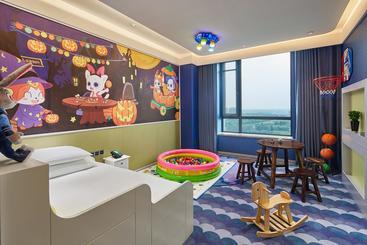 هتل Wanda Realm Resort Harbin Songbei