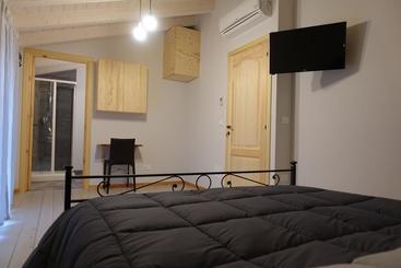 تختخواب و صبحانه Rooms Maison 3 Magnoni