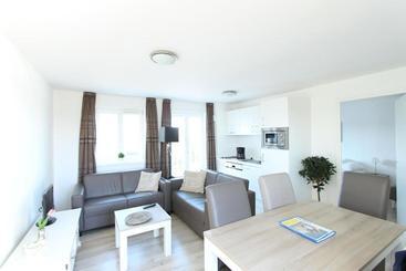 اقامتگاه Holiday Suites Oye Plage