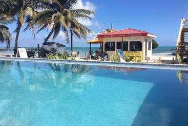 בית מלון כפרי The Beach Club Resort At Caye Caulker