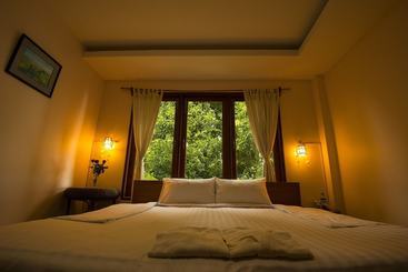 هاستل Mango Hill Inn