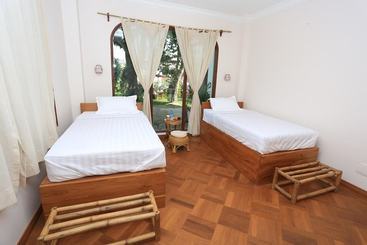 هاستل Mango Hill Inn